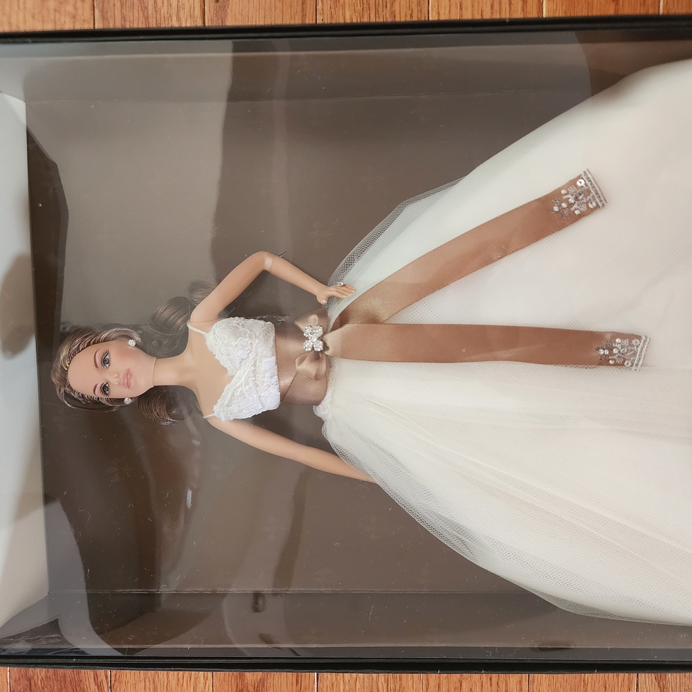 Elegant White and Brown Doll with Embellished Dress